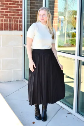 Black pleated midi skirt