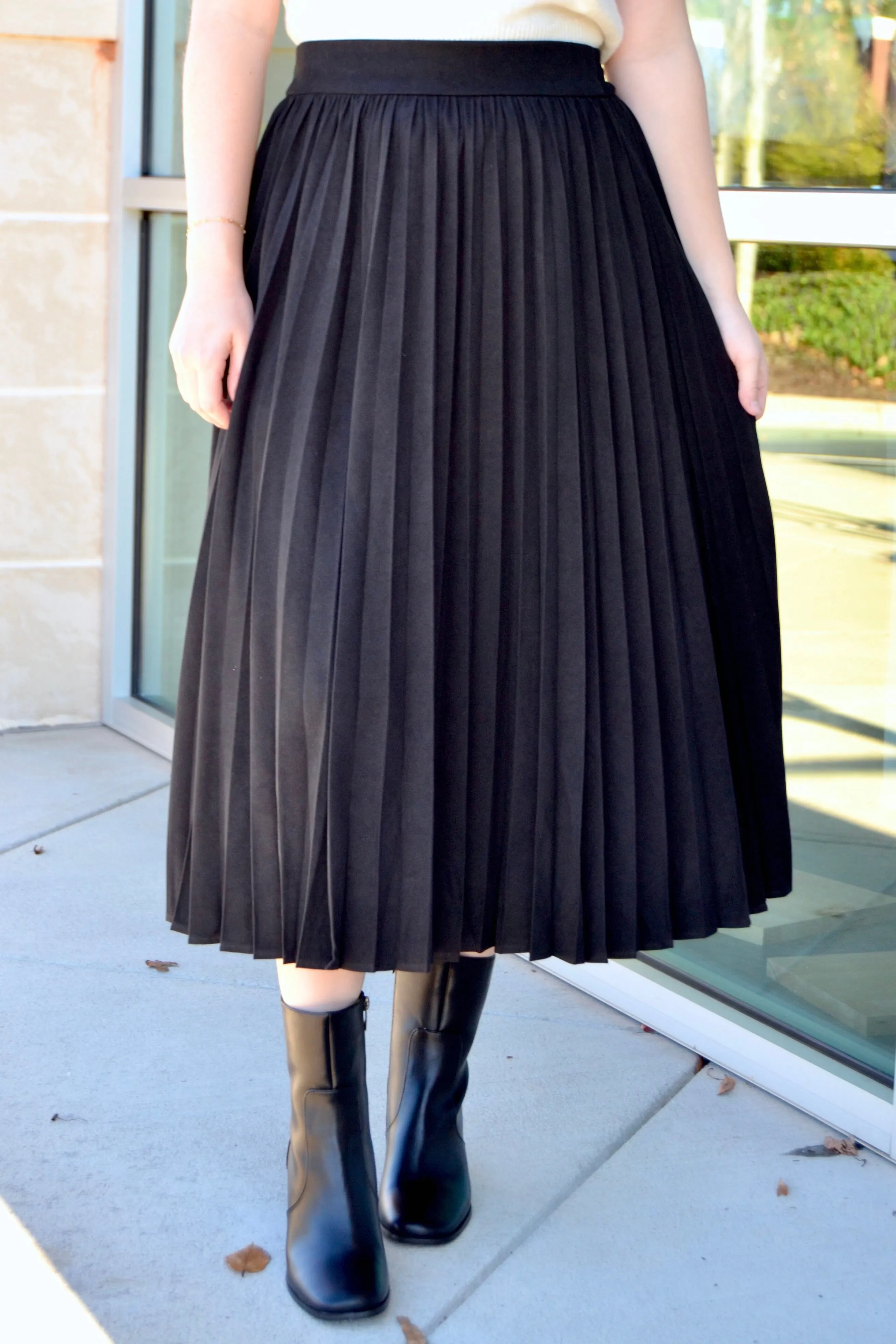 Black pleated midi skirt